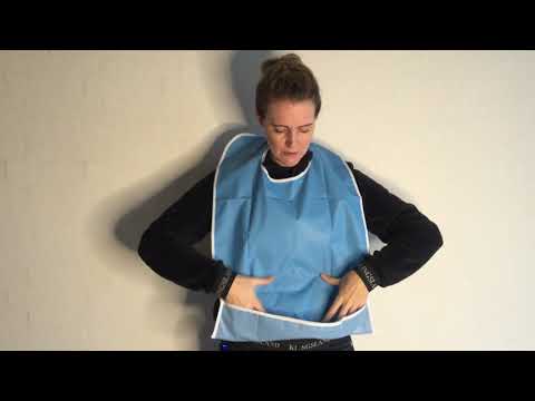 Bib with velcro closure - easy to clean (65x45). 4 different colors